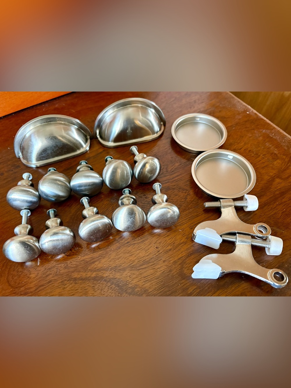 Brushed Nickel Cabinet Knobs, Cup Pulls, & Assorted Hardware.